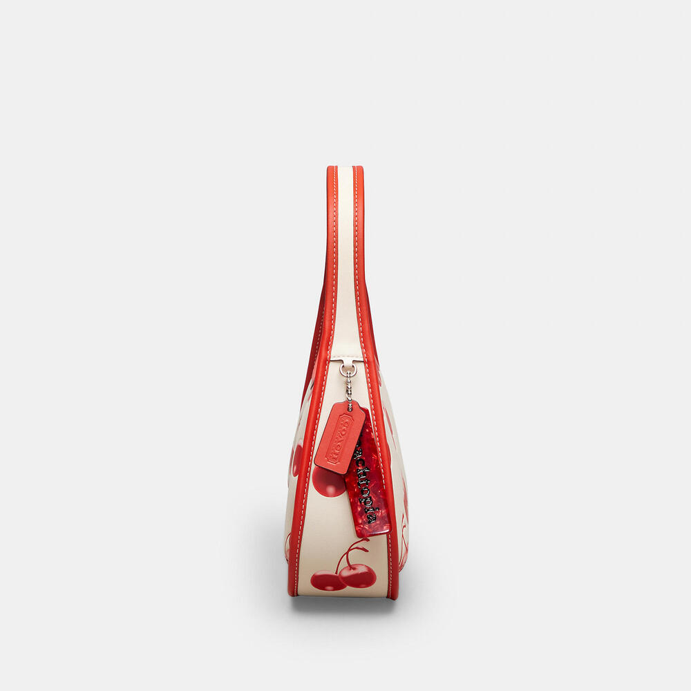 Ergo Bag In Coachtopia Leather With Cherry Print